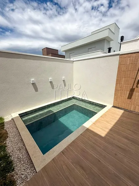 Casa térrea com 3 suítes, escritório e piscina no Condomínio OuroVille: 3ª foto da galeria de imagens do imóvel