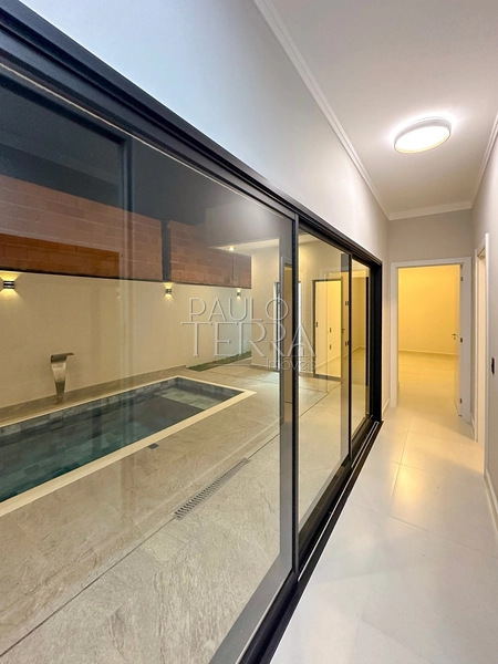 Casa em condomínio fechado à venda em Tremembé | Casa térrea de alto padrão com 3 suítes, escritório, piscina e planejados no Morada do Visconde: 39ª foto da galeria de imagens do imóvel