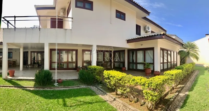 Casa de alto padrão com 4 suítes e piscina. Condomínio Taubaté Village: 1ª foto da galeria de imagens do imóvel