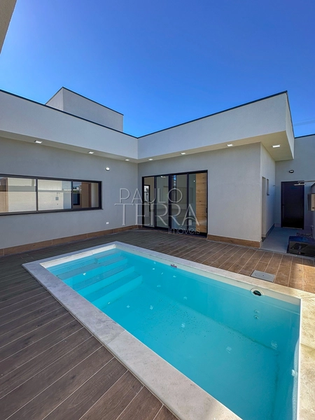 Casa com 4 quartos em Taubaté no Condomínio Ouroville | Armários, churrasqueira e piscina: 1ª foto da galeria de imagens do imóvel