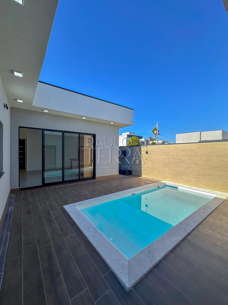 Casa com 4 quartos em Taubaté no Condomínio Ouroville | Armários, churrasqueira e piscina: 3ª foto da galeria de imagens do imóvel