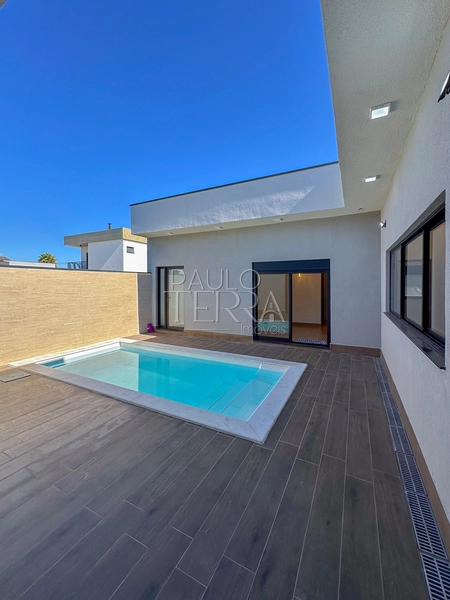 Casa com 4 quartos em Taubaté no Condomínio Ouroville | Armários, churrasqueira e piscina: 5ª foto da galeria de imagens do imóvel