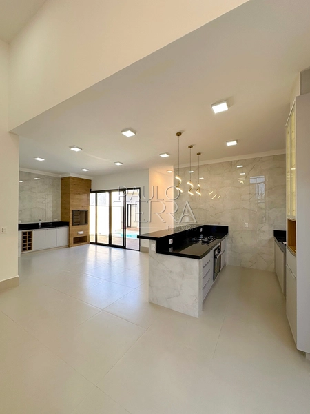 Casa com 4 quartos em Taubaté no Condomínio Ouroville | Armários, churrasqueira e piscina: 8ª foto da galeria de imagens do imóvel