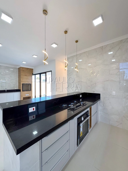 Casa com 4 quartos em Taubaté no Condomínio Ouroville | Armários, churrasqueira e piscina: 16ª foto da galeria de imagens do imóvel