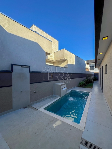 Casa em condomínio fechado em Tremembé pronta para morar, com armários planejados em todos os ambientes, energia fotovoltaica e piscina.: 30ª foto da galeria de imagens do imóvel