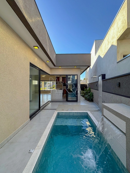 Casa em condomínio fechado em Tremembé pronta para morar, com armários planejados em todos os ambientes, energia fotovoltaica e piscina.: 2ª foto da galeria de imagens do imóvel