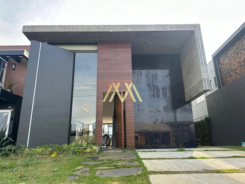 Casa beira lago localizada no Condomínio Riviera em Xangri-lá.: 1ª foto da galeria de imagens do imóvel