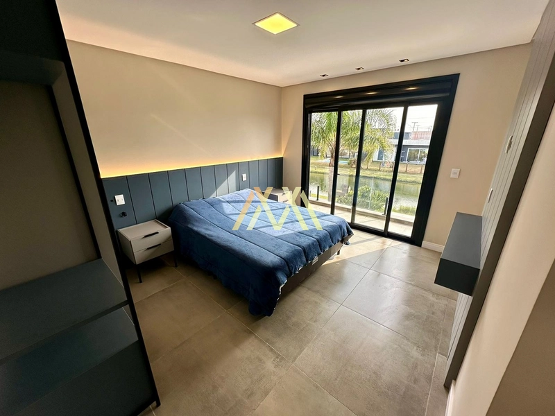 Casa beira lago localizada no Condomínio Riviera em Xangri-lá.: 12ª foto da galeria de imagens do imóvel
