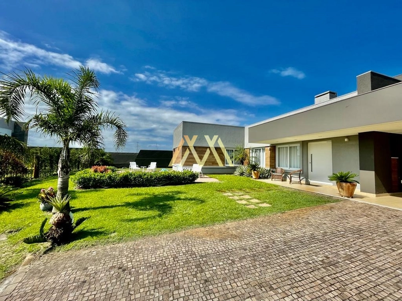 Casa à venda no condomínio Lagoa do Passo em Atlântida Sul!: 2ª foto da galeria de imagens do imóvel