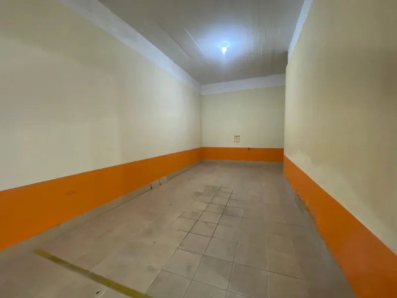 SACADA DE FRENTE COM CHURRASQUEIRA: 17ª foto da galeria de imagens do imóvel