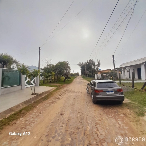 Casa com 04 dormitório na Praia Real/Torres: 3ª foto da galeria de imagens do imóvel