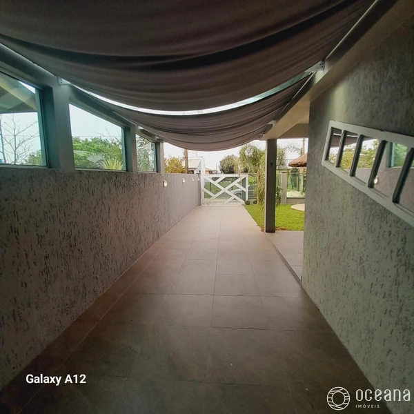 Casa com 04 dormitório na Praia Real/Torres: 34ª foto da galeria de imagens do imóvel