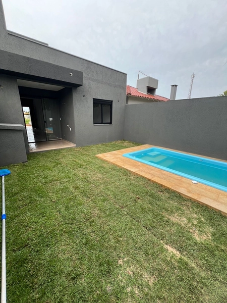 CASA GEMINADA EM CAPÃO NOVO VILLAGE: 3ª foto da galeria de imagens do imóvel
