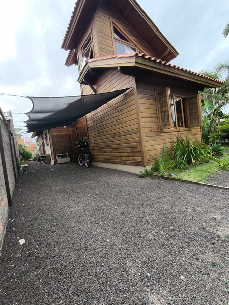 Casa 5 dormitórios no bairro araçá próximo ao centro de capão da canoa: 4ª foto da galeria de imagens do imóvel