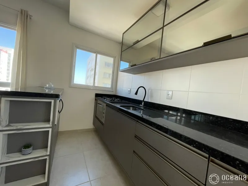 Apartamento com sacada integrada com churrasqueira na Zona Nova.: 6ª foto da galeria de imagens do imóvel