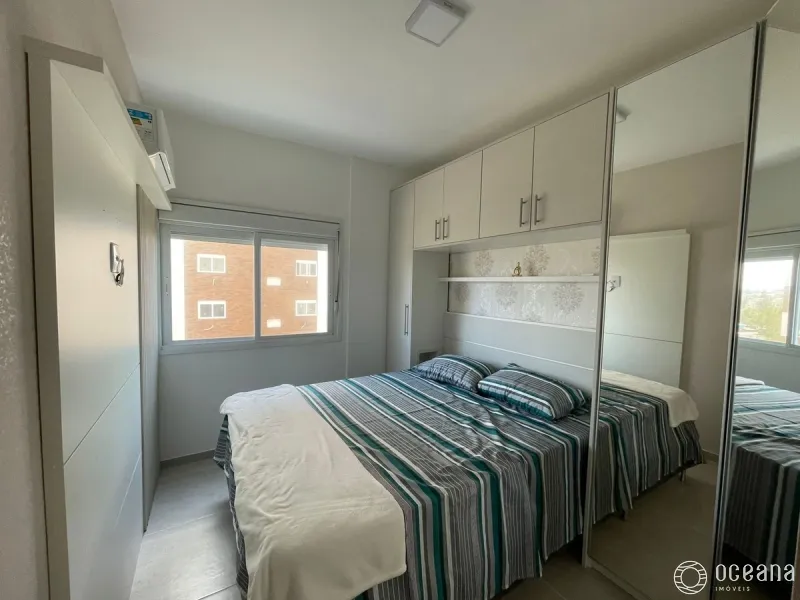 Apartamento com sacada integrada com churrasqueira na Zona Nova.: 12ª foto da galeria de imagens do imóvel