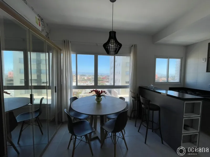 Apartamento com sacada integrada com churrasqueira na Zona Nova.: 4ª foto da galeria de imagens do imóvel
