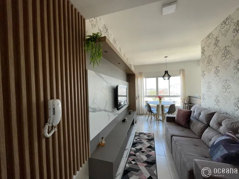Apartamento com sacada integrada com churrasqueira na Zona Nova.: 3ª foto da galeria de imagens do imóvel