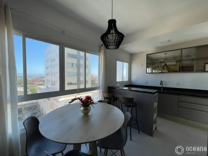 Apartamento com sacada integrada com churrasqueira na Zona Nova.: 1ª foto da galeria de imagens do imóvel