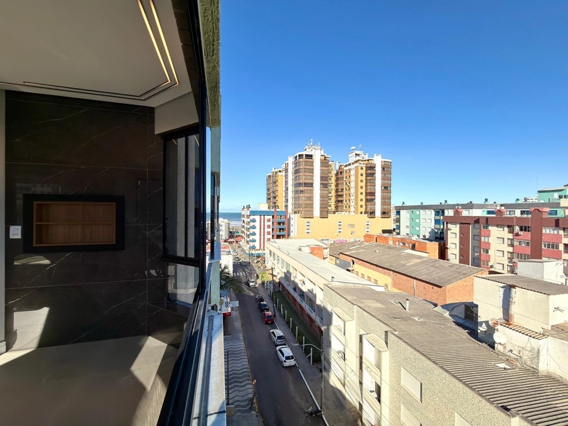 APARTAMENTO À VENDA, SACADA COM CHURRASQUEIRA E VISTA MAR!: 3ª foto da galeria de imagens do imóvel