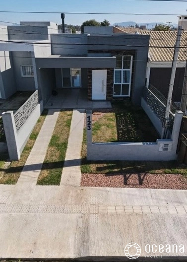 CASA COM TERRAÇO 03 QUADRAS DO MAR EM CAPAO DA CANOA: 13ª foto da galeria de imagens do imóvel