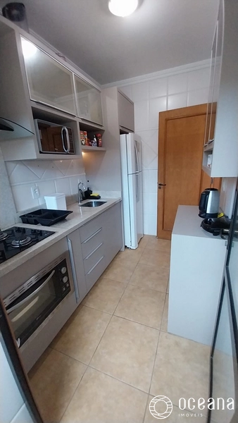 APARTAMENTO DE 02 DORMITÓRIOS COM SACADA INTEGRADA COM CHURRASQUEIRA E VISTA PARA PARA O MAR!: 6ª foto da galeria de imagens do imóvel