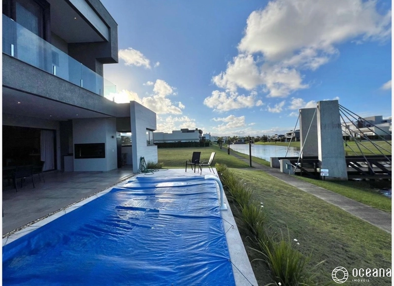 CASA EM COND. FECHADO COMPOSTA POR 05 DORMITÓRIOS, SENDO 04 SUÍTES!: 3ª foto da galeria de imagens do imóvel