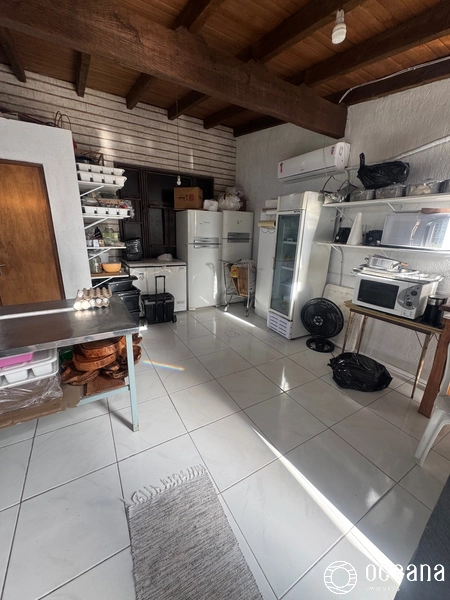 CASA LOCALIZADA NO CENTRO DE XANGRI-LÁ: 13ª foto da galeria de imagens do imóvel