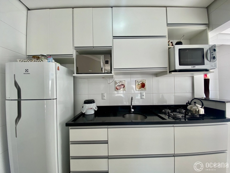 APARTAMENTO MOBILIADO DE 02 DORMITÓRIOS COM VAGA E TERRAÇO EM L: 12ª foto da galeria de imagens do imóvel