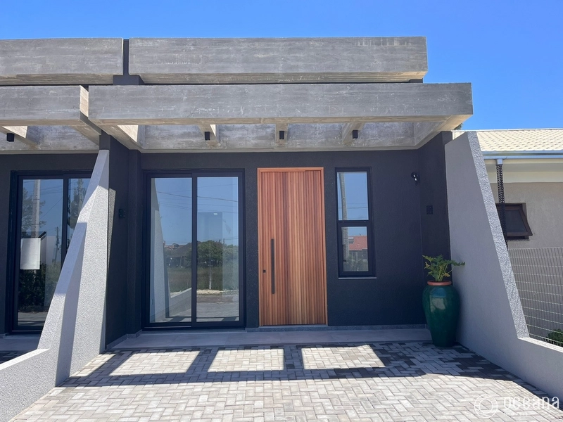 CASA com 2 suites, lavabo, e pátio fundos.: 1ª foto da galeria de imagens do imóvel