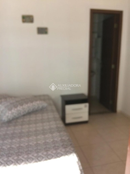 Casa com 4 Suítes em Canasvieiras: 10ª foto da galeria de imagens do imóvel