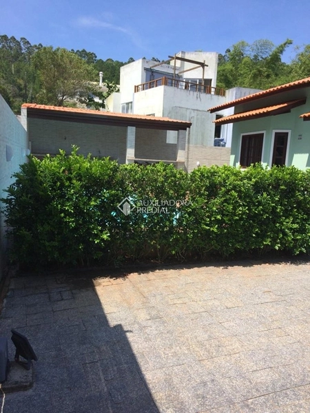 Casa com 4 Suítes em Canasvieiras: 20ª foto da galeria de imagens do imóvel