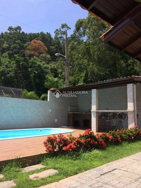 Casa com 4 Suítes em Canasvieiras: 31ª foto da galeria de imagens do imóvel