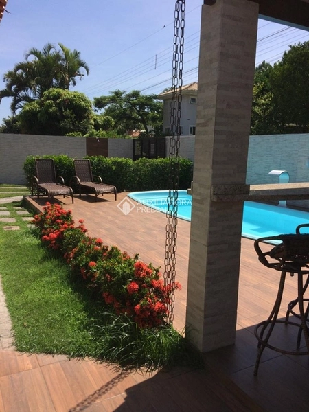Casa com 4 Suítes em Canasvieiras: 21ª foto da galeria de imagens do imóvel