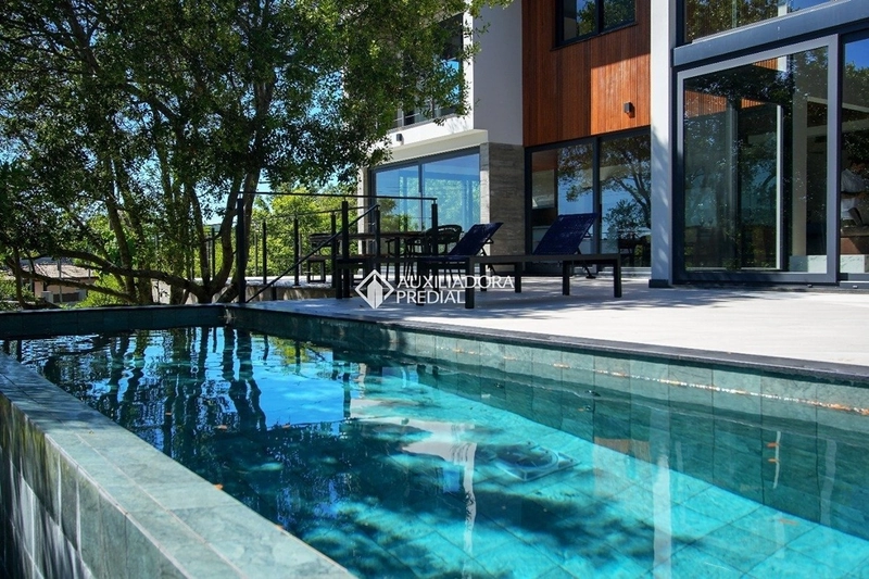 Casa em condomínio exclusivo | Porto da Lagoa | Acesso privativo à praia: 1ª foto da galeria de imagens do imóvel