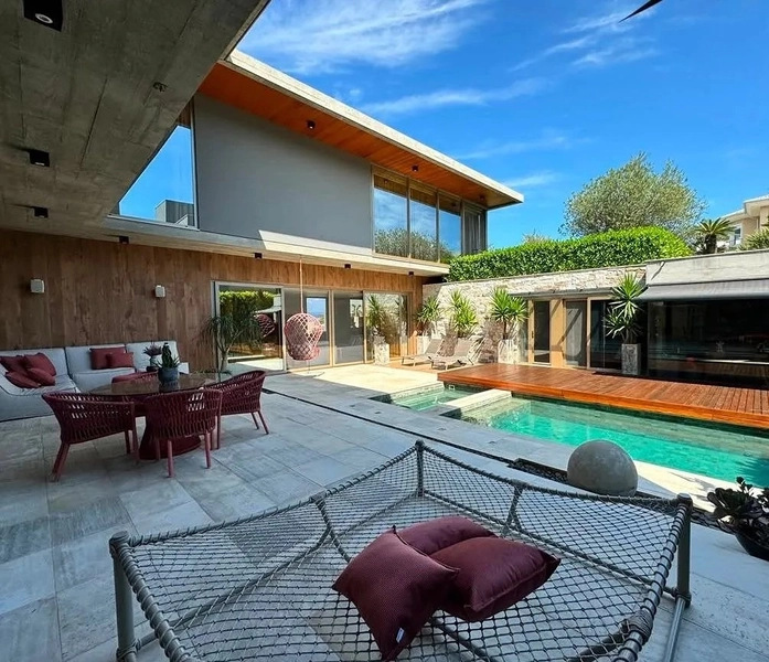 Casa em condomínio de alto padrão em Cacupé | 4 suítes | Vista para o mar: 17ª foto da galeria de imagens do imóvel