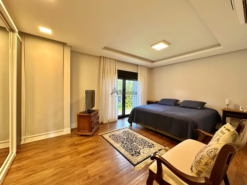 Casa no Condomínio Carmel com 215 m², 3 suítes, ambientes integrados, cortinas automatizadas e excelente localização na Avenida Central de Atlântida.: 10ª foto da galeria de imagens do imóvel