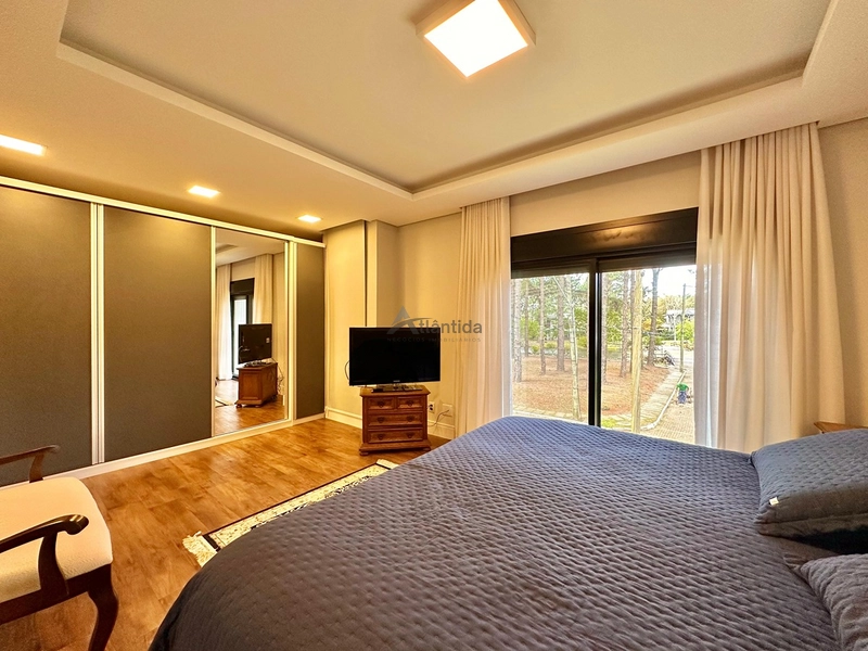 Casa no Condomínio Carmel com 215 m², 3 suítes, ambientes integrados, cortinas automatizadas e excelente localização na Avenida Central de Atlântida.: 23ª foto da galeria de imagens do imóvel