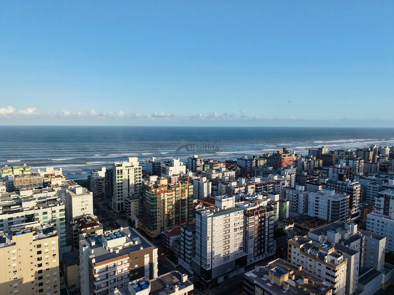 Apartamento de esquina na Zona Nova com 3 dormitórios, vista para o mar, sol da manhã, mobiliado e decorado, com 1 box para carro.: 15ª foto da galeria de imagens do imóvel