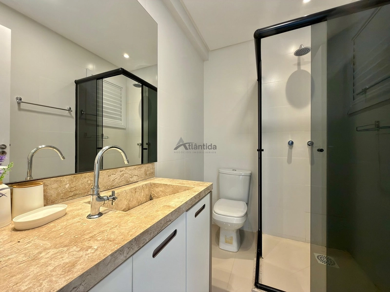 Apartamento na Zona Nova com 2 dormitórios, sacada de frente, mobiliado e decorado, 1 box e rooftop com espaço gourmet e vista para o mar, a 1 quadra da praia.: 13ª foto da galeria de imagens do imóvel