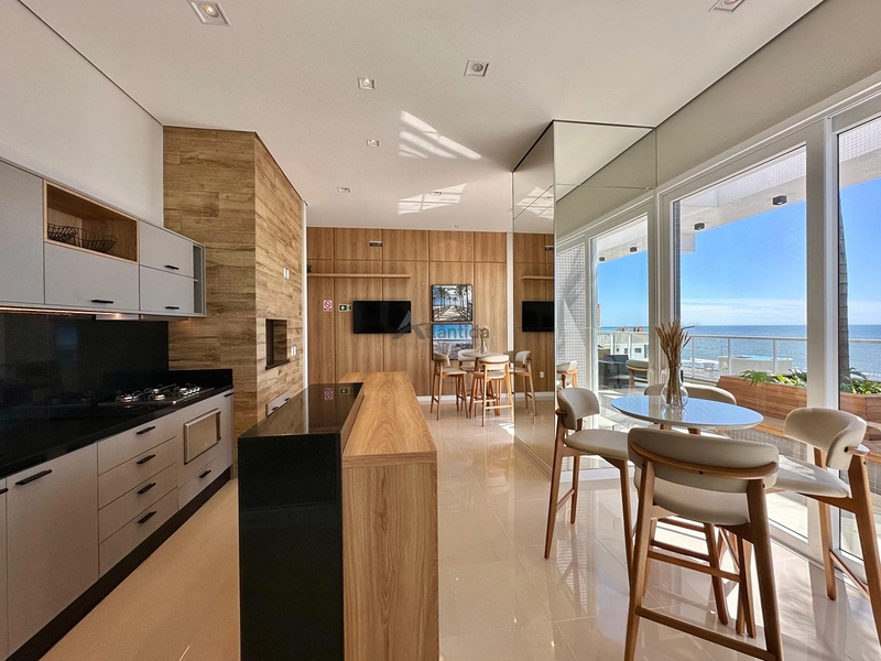 Apartamento na Zona Nova com 2 dormitórios, frente leste, sacada separada, climatizado, mobiliado e decorado, em edifício com rooftop, piscina e infraestrutura completa, a 1 quadra do mar.: 5ª foto da galeria de imagens do imóvel