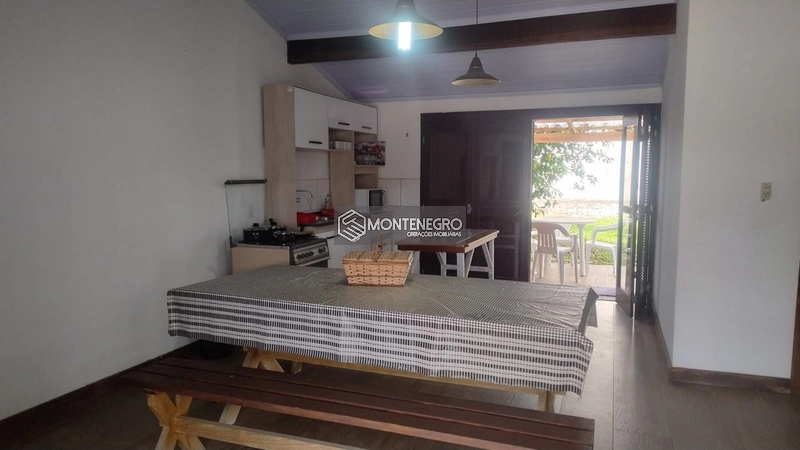 Casa 3 Dormitórios com Lareira em Capão Novo: 7ª foto da galeria de imagens do imóvel