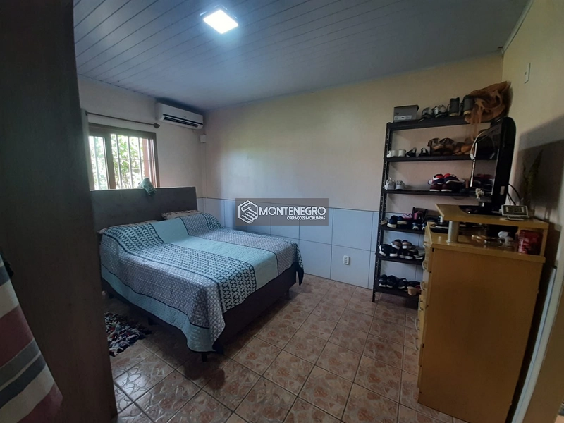 Em ótima localização casa Rua Jasmim: 11ª foto da galeria de imagens do imóvel