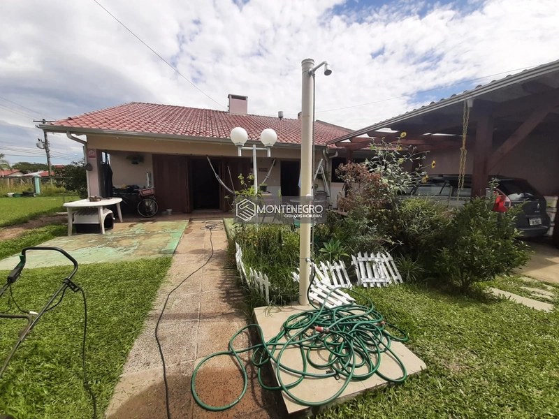 Em ótima localização casa Rua Jasmim: 3ª foto da galeria de imagens do imóvel