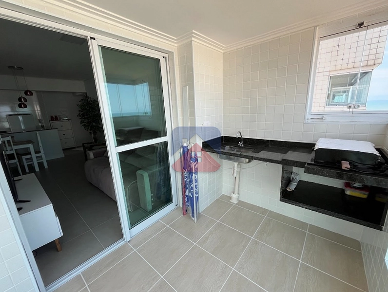 APARTAMENTO 2 DORMITÓRIOS COM 1 SUÍTE, VARANDA GOURMET E VISTA MAR – FLÓRIDA: 4ª foto da galeria de imagens do imóvel