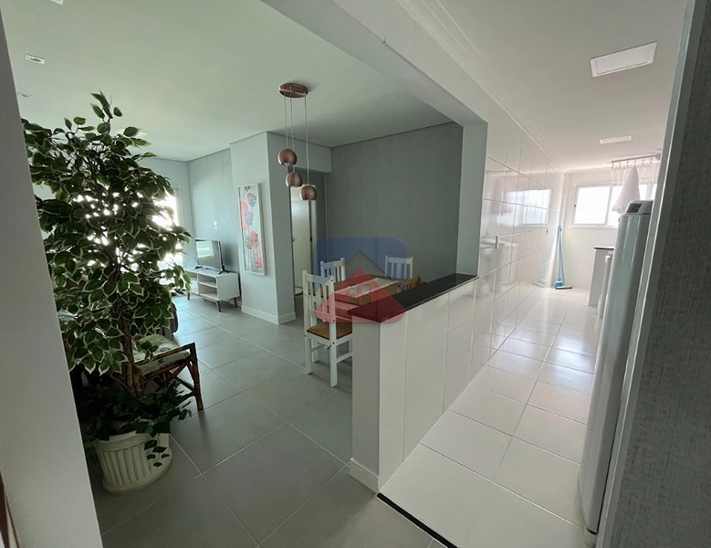 APARTAMENTO 2 DORMITÓRIOS COM 1 SUÍTE, VARANDA GOURMET E VISTA MAR – FLÓRIDA: 9ª foto da galeria de imagens do imóvel