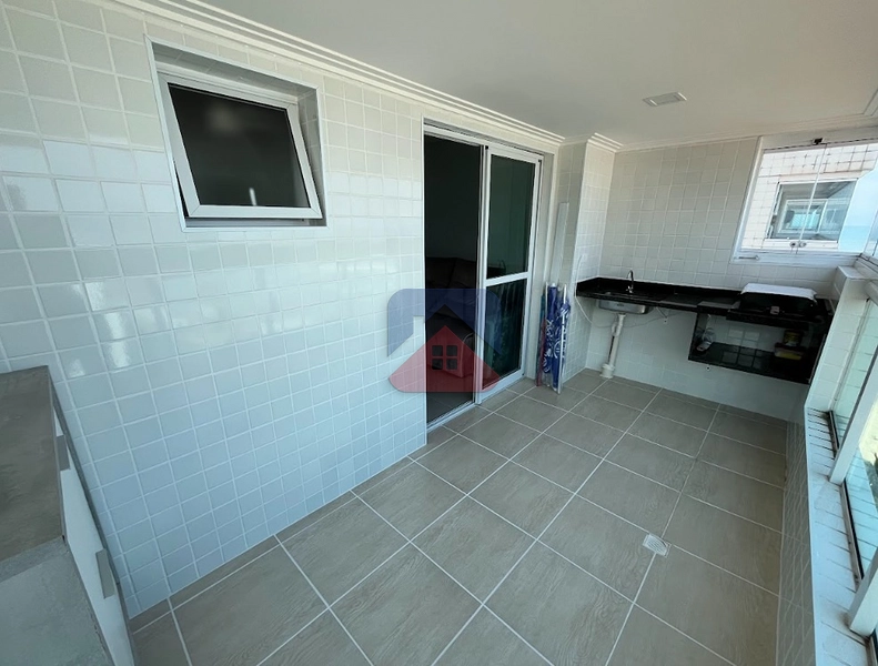 APARTAMENTO 2 DORMITÓRIOS COM 1 SUÍTE, VARANDA GOURMET E VISTA MAR – FLÓRIDA: 3ª foto da galeria de imagens do imóvel
