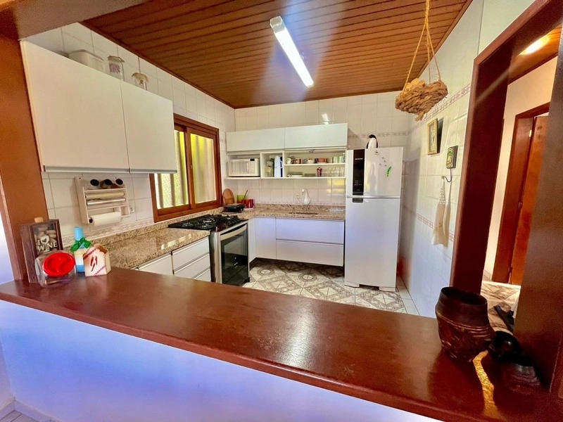 Casa com Suíte, Churrasqueira e Living Integrado: 19ª foto da galeria de imagens do imóvel