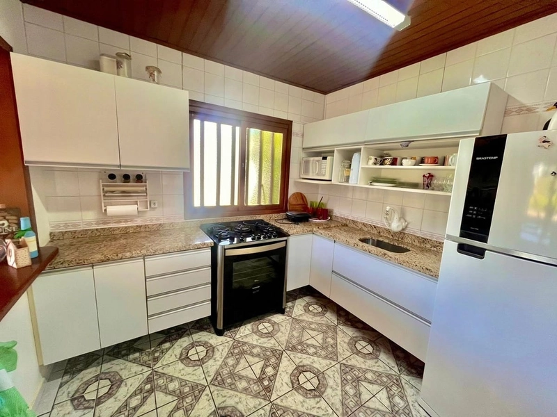 Casa com Suíte, Churrasqueira e Living Integrado: 20ª foto da galeria de imagens do imóvel