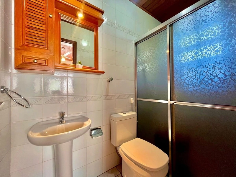 Casa com Suíte, Churrasqueira e Living Integrado: 27ª foto da galeria de imagens do imóvel